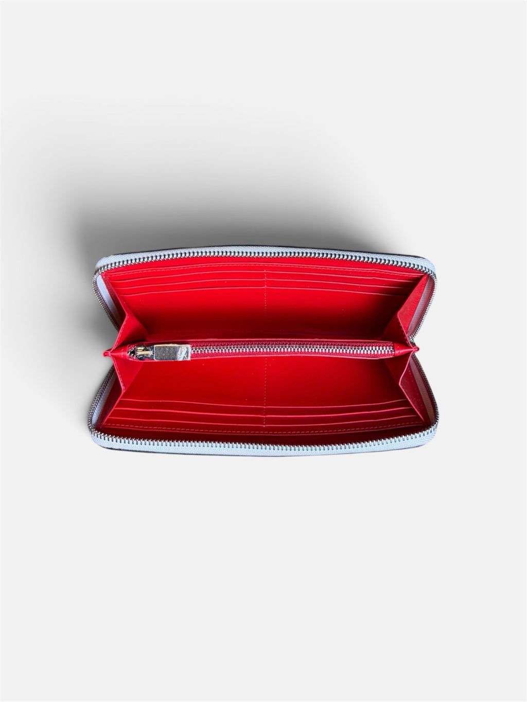 Last Season Christian Louboutin Panettone zip-around wallet with vibrant red interior and silver hardware
