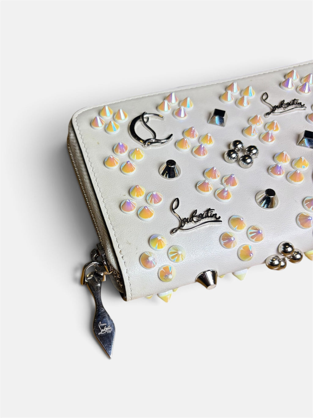 Last Season Christian Louboutin white leather wallet featuring iridescent studs and signature metallic hardware.