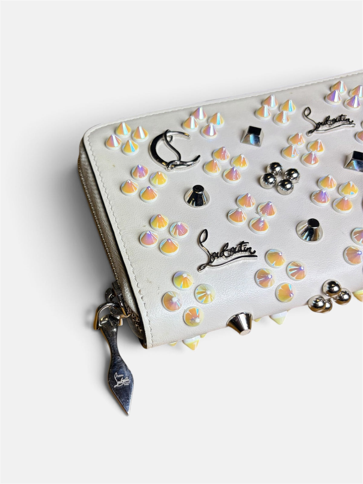 Last Season Christian Louboutin white leather wallet featuring iridescent studs and signature metallic hardware.