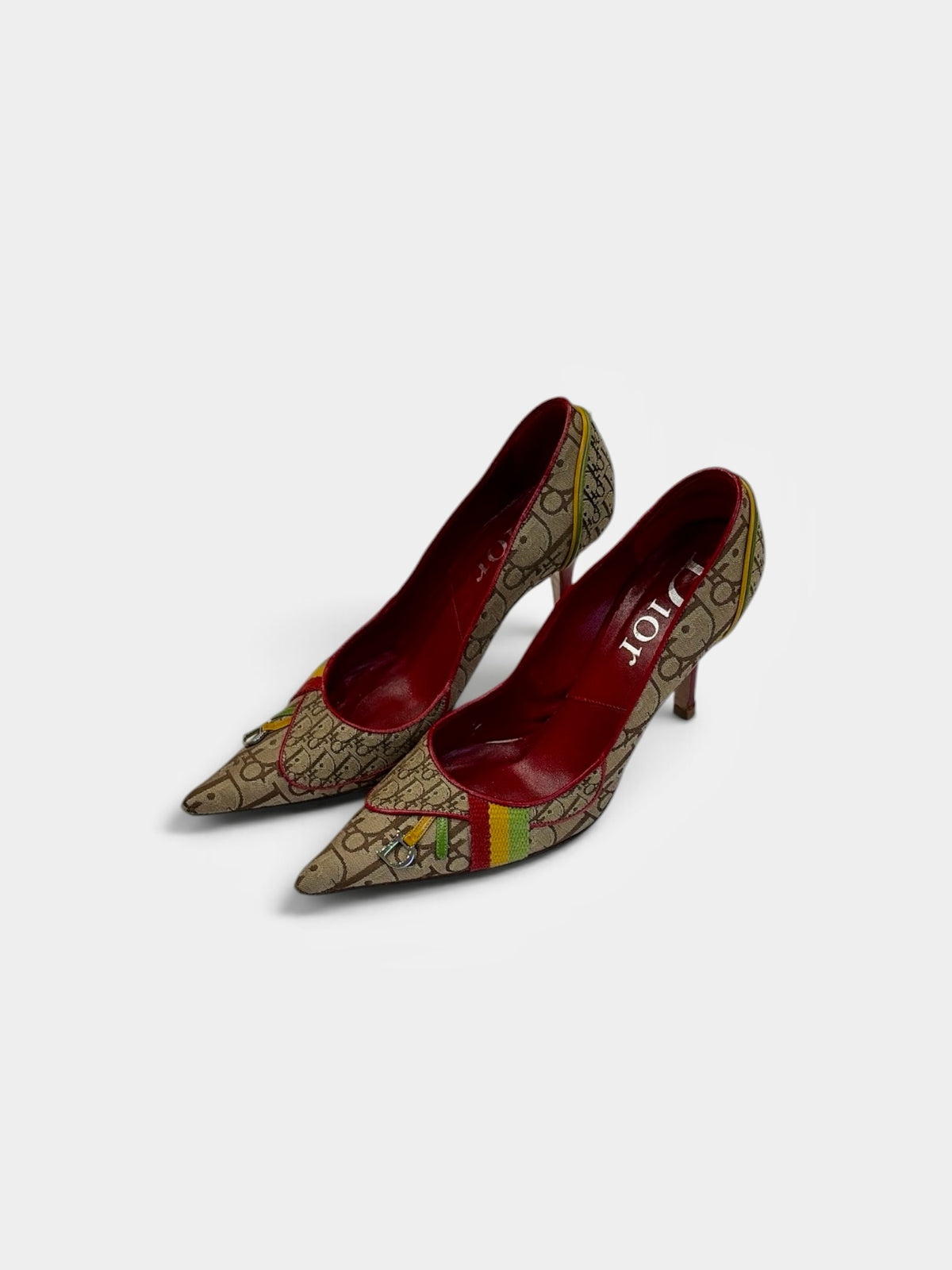 Last Season vintage Dior monogram canvas pointed toe stiletto pumps with red leather lining and colorful accents