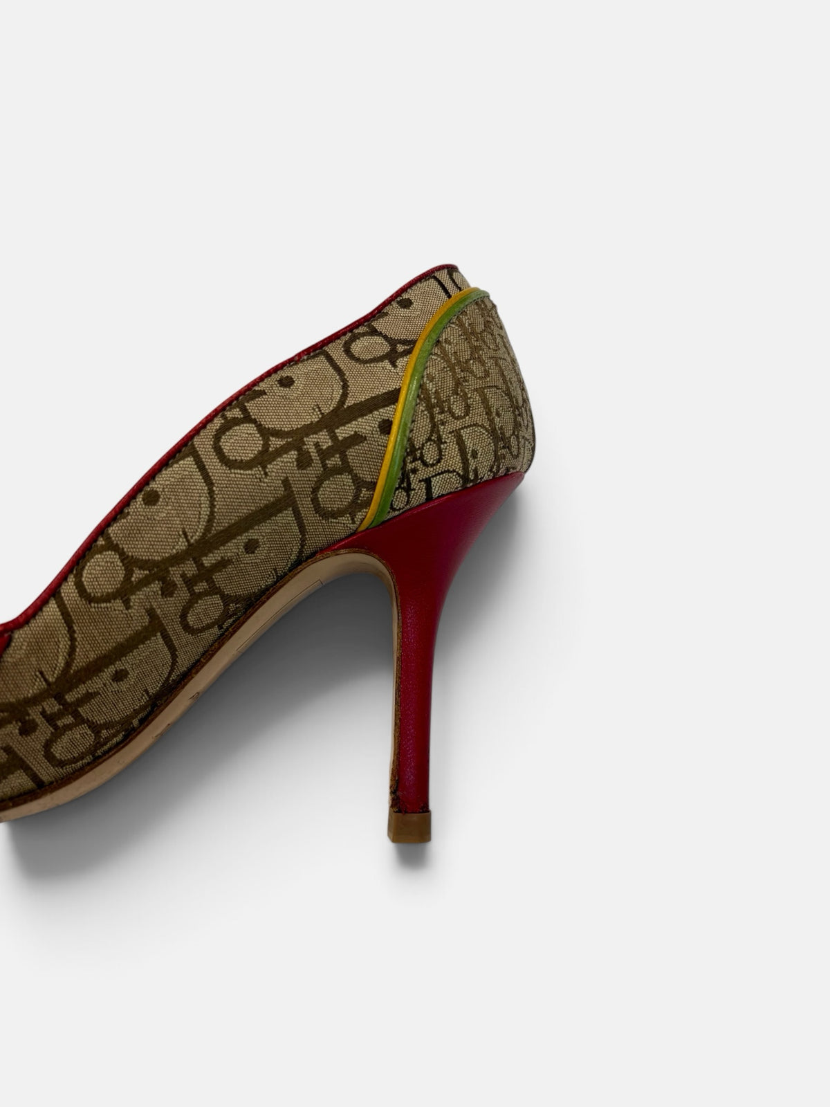 Last Season vintage Dior monogram canvas stiletto pumps with red leather heel and yellow green piping detail