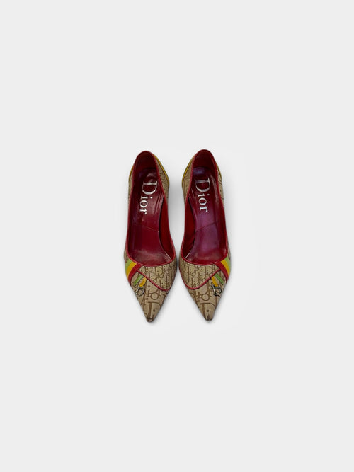 Last Season vintage Dior pointed toe stiletto pumps in monogram canvas with red, yellow, and green accents.