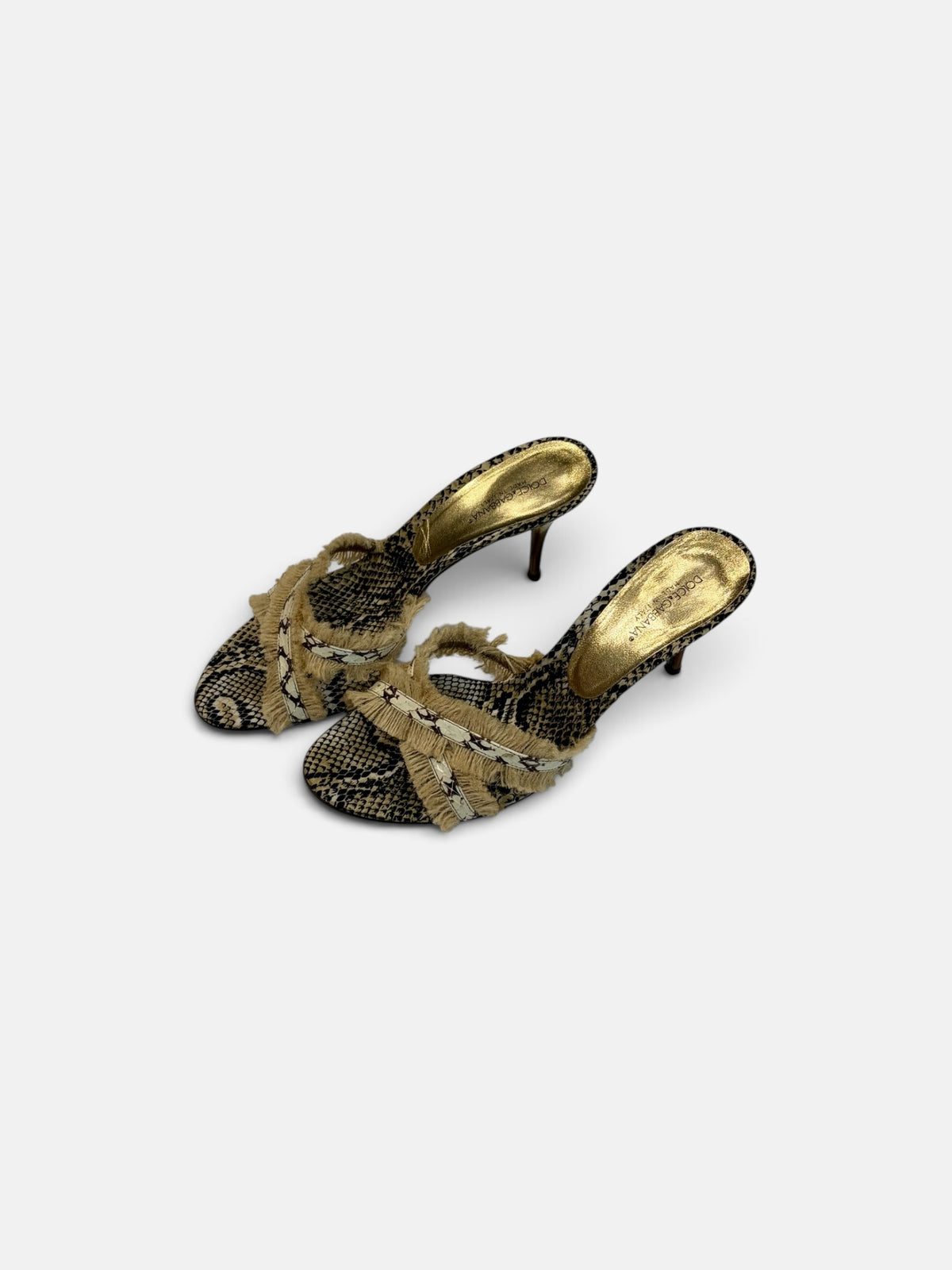Last Season Dolce & Gabbana snakeskin-print high heel mules with crossover straps and frayed fringe detailing.
