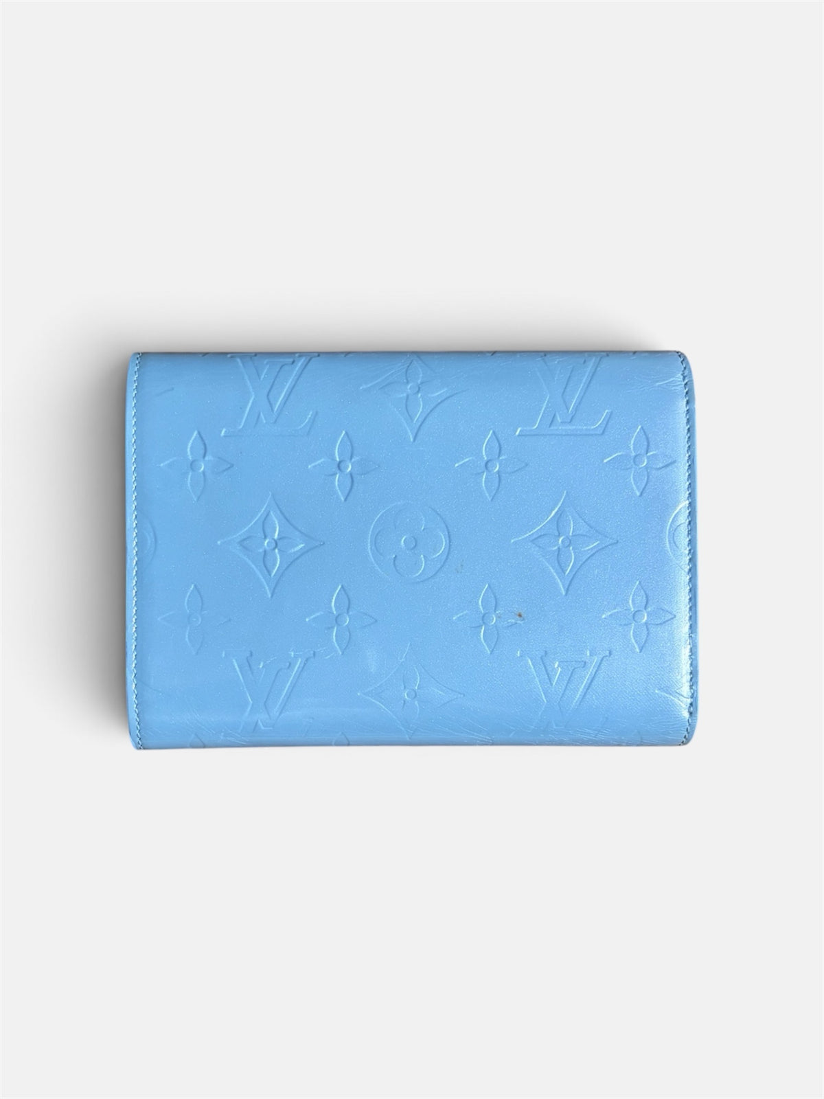 Last Season Louis Vuitton blue patent leather wallet with embossed Monogram pattern and snap-button closure