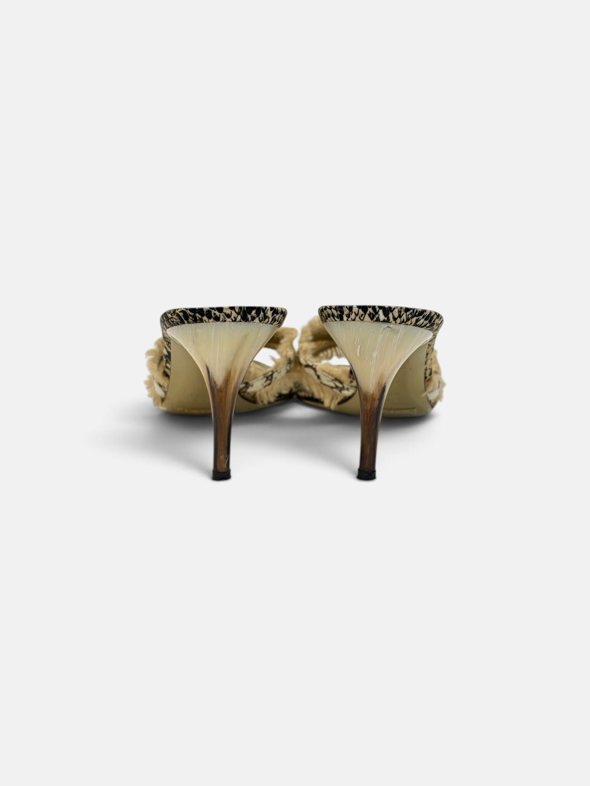 Last Season Dolce & Gabbana snakeskin-print mules with frayed fringe straps and tapered heels, back view.